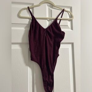 Body suit with keyhole